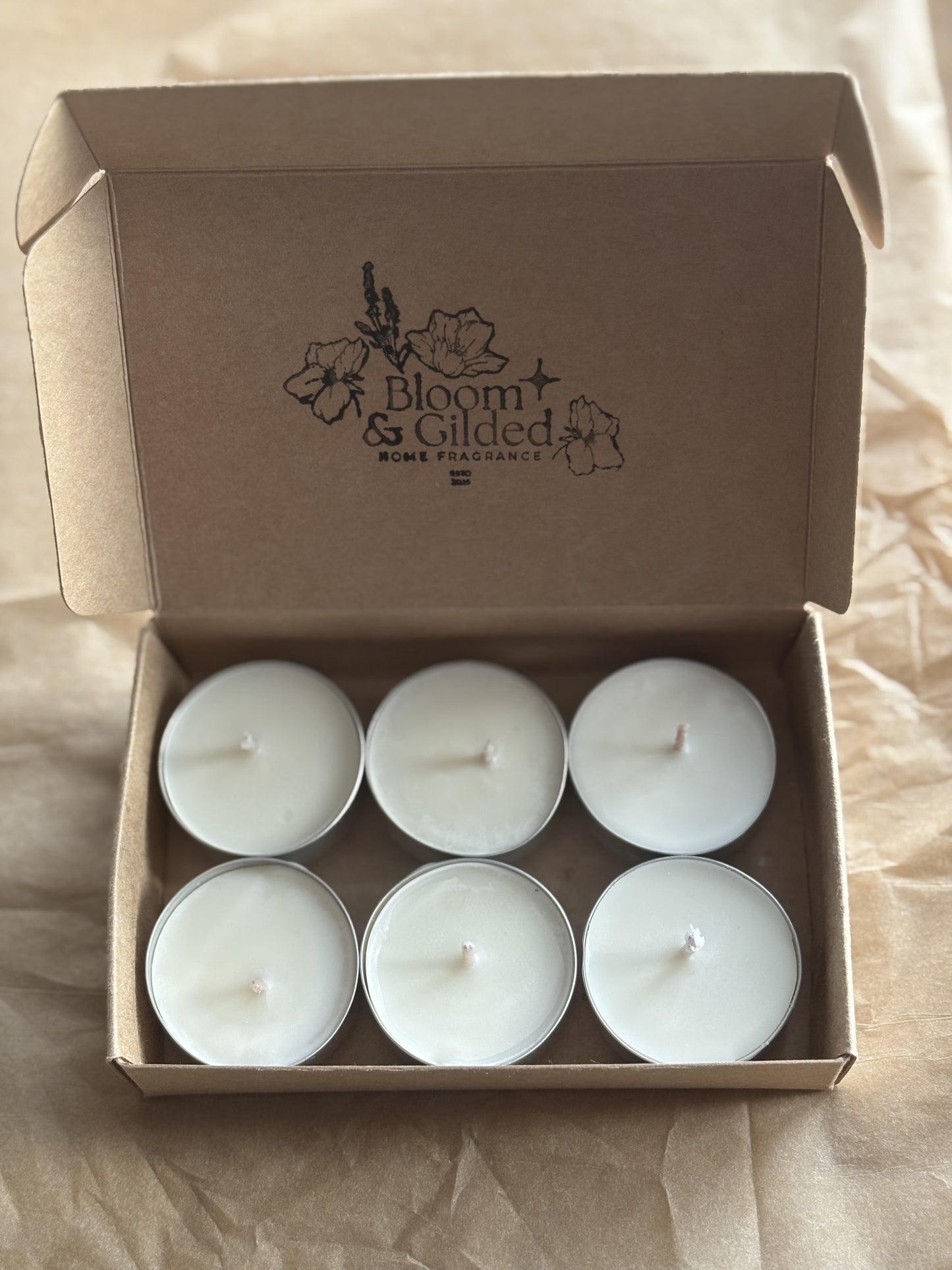 NATURAL SOY WAX TEA LIGHTSPrice: £5
6 per pack
Pure. Simple. Quietly beautiful.
Sometimes all a space needs is a gentle, clean flame.
Bloom & Gilded’s unscented tea lights are hand poured in the UK using natural soy sustainably sourced, completely paraffin free. Each tea light is finished with a natural cotton wick, free from paraffin coating, for a cleaner, slower burn.
No fragrance. No additives. Just honest, natural candlelight.
Perfect for pairing with your wax melts, creating atmosphere, or simply sitt
