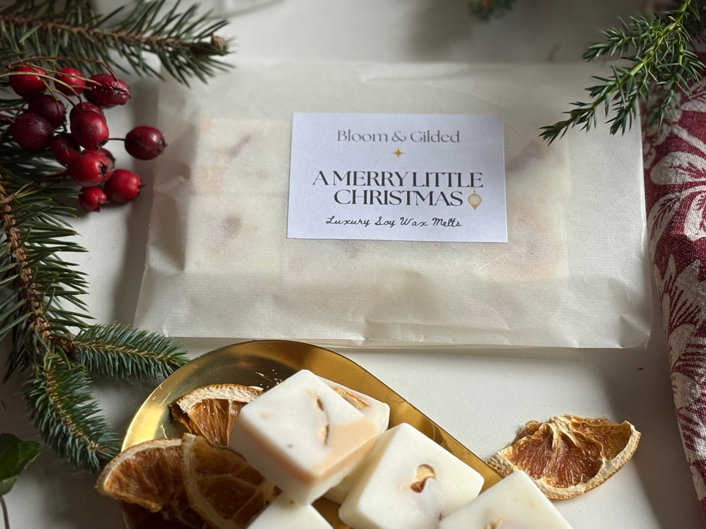 A joyful botanical blend that sparkles like early-evening laughter. Bright citrus and juniper are softened by lavender and lemon verbena, creating a naturally uplifting scent that fills the room with gentle festive cheer.

A Merry Little Christmas is a pure essential oil blend with scent notes of sparkling citrus, juniper berry, lavender and lemon verbena.

Feels like the first toast of the season - golden, bright and full of possibility.

Pure essential oils • Vegan • Cruelty-free • Natural soy wax