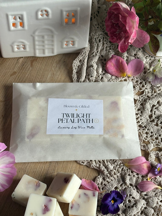  Twilight Petal Path Luxury Wax Melts - Peony Rose & Oud | Bloom and Gilded. Hand-poured luxury wax melts with peony, rose & oud. Adorned with pink rosebud petals. Romantic & mysterious floral scent. UK made wax melts.